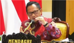 Menteri Dalam Negeri Tito Karnavian Tito saat Pengarahan Gugus Tugas Covid-19 di Provinsi Kalimantan Tengah yang ditayangkan online pada Minggu, 19 Juli 2020. (Foto: Screengrab)