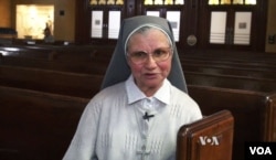 Sister Celia Cid discusses Pope Francis' appeal to Hispanic Americans at St. Elizabeth's church in Manhattan, NY, Sept 17, 2015. (Photo: D. Schrier / VOA)
