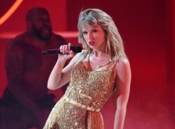 FILE - Taylor Swift performs at the American Music Awards in Los Angeles, Nov. 24, 2019. A documentary on Swift will kickoff the next Sundance Film Festival.