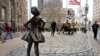 'Fearless Girl' Statue Stares Down Wall Street's Iconic Bull