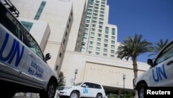 United Nation vehicles carrying the Organization for the Prohibition of Chemical Weapons (OPCW) inspectors are seen in Damascus, Syria on April 18, 2018. (Ali Hashisho/Reuters)