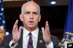 FILE - Rep. Adam Smith, D-Wash., speaks during a news conference on Capitol Hill in Washington.