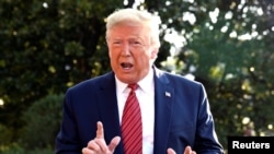 Predsednik Tramp odgovara na pitanja reportera u Beloj kući, pred polazak za Teksas, 22. septembra 2019. 