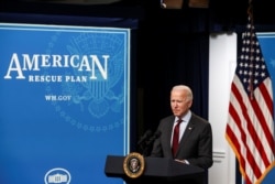 U.S. President Joe Biden announces changes to the main U.S. coronavirus disease (COVID-19) aid program for small businesses during brief remarks in the South Court Auditorium at the White House in Washington, U.S., February 22, 2021. REUTERS