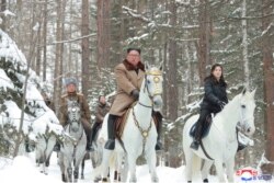 North Korean leader Kim Jong Un rides a horse as he visits battle sites in areas of Mt Paektu, Ryanggang, North Korea, i