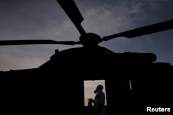 A Brazilian army forces soldier is pictured as he attends a training against chemical, biological, radiological and nuclear attacks ahead of the Rio 2016 Olympic Games at Rio de Janeiro air base, Brazil, July 15, 2016.