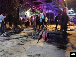 Motorcycles are strewn about after an explosion in Bangkok, Aug. 17, 2015.