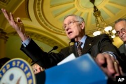 FILE - Senate Minority Leader Harry Reid