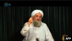 FILE - This image from video obtained Oct. 26, 2012, courtesy of the Site Intelligence Group, shows al-Qaida leader Ayman al-Zawahiri speaking in a video, from an undisclosed location, released by al-Qaida’s media arm.