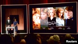 Actor John Krasinski (L) and Academy of Motion Picture Arts and Sciences President Cheryl Boone Isaacs announce the nominees for the Best Actress in a Supporting Role during the nominations announcements for the 88th Academy Awards in Beverly Hills, Calif
