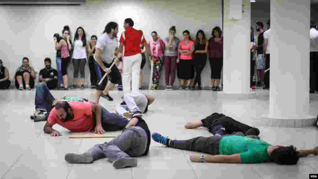 With no opera house in Lebanon, the troupe had to rehearse where they could. Here, they make use of a local government building. (Photo: John Owens for VOA)