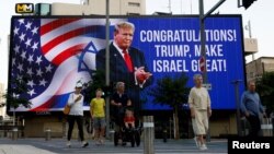 Ucapan Selamat atas kemenangan dalam Pemilu Amerika 2024 kepada calon presiden dari Partai Republik dan mantan Presiden Amerika Donald Trump di Tel Aviv, Israel, 6 November 2024. (Thomas Peter/REUTERS)