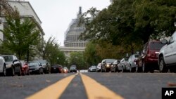 The Capitol Dome, covered with scaffolding is seen on Capitol Hill in Washington, Wednesday, Sept. 30, 2015.