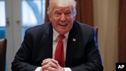 President Donald Trump speaks during a briefing with Senior Military leaders in the Cabinet Room of the White House in Washington, Oct. 5, 2017. 