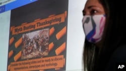 Susannah Remillard teaches her sixth-grade students at Cape Cod Lighthouse Charter School, Thursday, Nov. 19, 2020, in East Harwich, Mass. In a growing number of U.S. schools, students are now learning a more complex Thanksgiving story. (AP Photo/Elise Amendola)