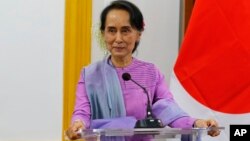 Myanmar's State Counselor and Foreign Minister Aung San Suu Kyi speaks to the media during a joint press conference with Japanese Foreign Minister Taro Kono at the Ministry of Foreign Affairs in Naypyitaw, Jan. 12, 2018.