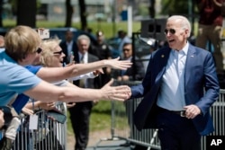 Democratic presidential candidate Joe Biden arrives for a campaign rally at Eakins Oval in Philadelphia, May 18, 2019.