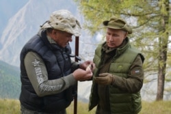 RUSSIA -- Russian President Vladimir Putin and Defense Minister Sergei Shoigu spend their vacation in the Siberian taiga, October 7, 2019