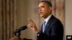 President Barack Obama speaking in the State Dining Room of the White House, Oct. 17, 2013.