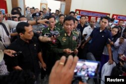 Myanmar's Home Affairs Minister Kyaw Swe speaks to the media during a news conference regarding the killing of Ko Ni, a lawyer advising the ruling National League for Democracy (NLD) party, in Yangon, Myanmar February 25, 2017.