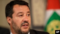FILE - The League party leader Matteo Salvini talks to the press in Rome, Aug. 22, 2019.
