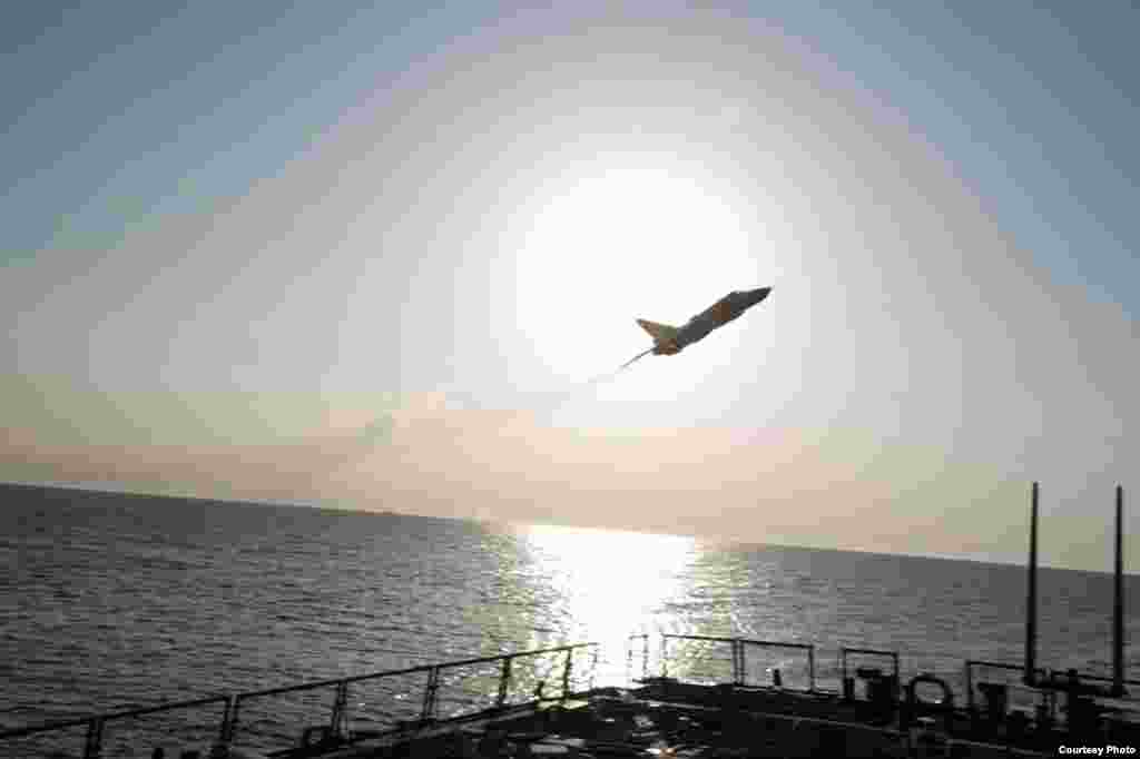Image of Russian fly-over near guided-missile destroyer USS Donald Cook in Baltic Sea as provided by the U.S. Navy 6th Fleet.