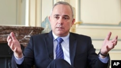 FILE - Israeli Strategic Affairs Minister Yuval Steinitz, shown in an interview in March 2015, says Iran continues to be a threat to his country and to all other nations in the Middle East. 