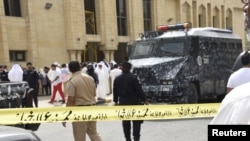 Police cordon off the Imam Sadiq Mosque after a bomb explosion following Friday prayers, in the Al Sawaber area of Kuwait City June 26, 2015.