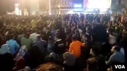 Residents of Behbahan in southwestern Iran stage a sit-in on a street on Nov. 15, 2019, in protest at the government’s sudden 50% increase in the subsidized price of gasoline earlier in the day. (Courtesy photo)