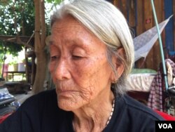 "Mommy" is being interviewed at her house after she came back from joining a protest against the controversial NGO law in July. (Phorn Bopha/VOA Khmer)