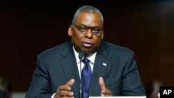 FILE - Defense Secretary Lloyd Austin speaks during a Senate Armed Services Committee hearing on the conclusion of military operations in Afghanistan and plans for future counterterrorism operations, on Capitol Hill, Sept. 28, 2021.