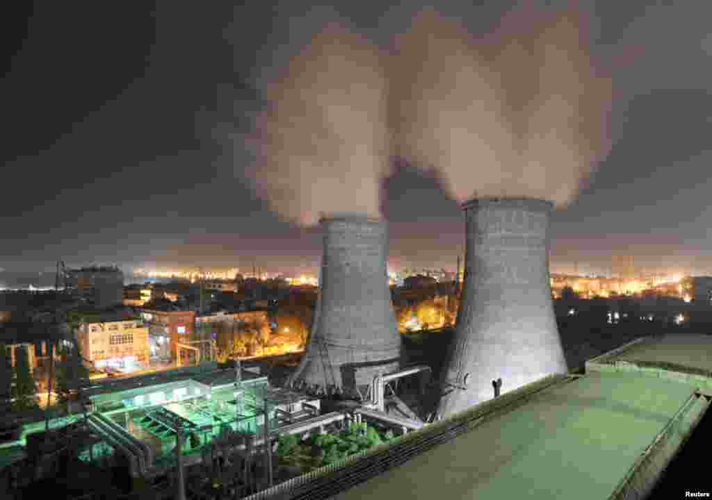 A coal-burning power station at night in Xiangfan, Hubei province, September 15, 2009. 