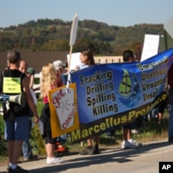 Local Evans City, Pennsylvania residents picket a local dairy that signed a lease with a gas company to fracture a well on its pastures.