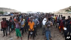 Ethiopian refugees gather in Qadarif region, eastern Sudan, Nov. 17, 2020.