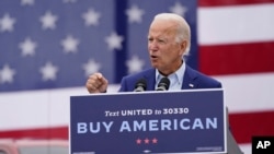 Democratic presidential candidate former Vice President Joe Biden speaks at a campaign event on manufacturing and buying American-made products at UAW Region 1 headquarters in Warren, Michigan, Sept. 9, 2020.