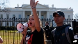 Sofia Hidalgo, 15, of Glenmont, Md., chants during a student protest for gun control legislation in front of the White House, Wednesday, Feb. 21, 2018, in Washington. (AP Photo/Evan Vucci)