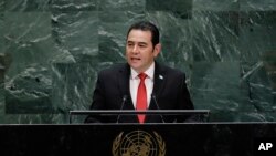 FILE - Then-Guatemalan President Jimmy Morales speaks at the United Nations, Sept. 25, 2019, in New York. Guatemalan journalists interviewed by the Committee to Protect Journalists said conditions deteriorated for them during Morales' time in office.