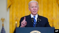 President Joe Biden delivers remarks on efforts to address global supply chain bottlenecks during an event in the East Room of the White House, Oct. 13, 2021.