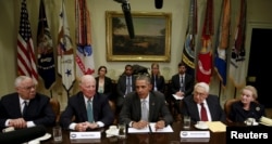 FILE - Former U.S. secretaries of state meet with President Barack Obama to discuss the Trans-Pacific Partnership at the White House in Washington, Nov. 13, 2015.