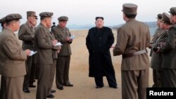 North Korean leader Kim Jong Un attends the testing of a newly developed tactical weapon, in this undated photo released Nov. 16, 2018, by North Korea's Korean Central News Agency.