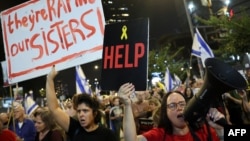 Demonstrators gathered in front of the Israeli Defense Ministry in Tel Aviv, Israel, call for the release of Israeli hostages held captive since the October 7 attacks by Palestinian militants in the Gaza Strip, Nov. 2, 2024.