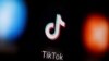 A TikTok logo is displayed on a smartphone in this illustration.