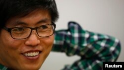 Shin Dong-hyuk, a North Korean defector who has given the U.N. panel harrowing accounts of his life and escape from a prison camp, smiles during an interview with Reuters in Seoul, February 10, 2014.