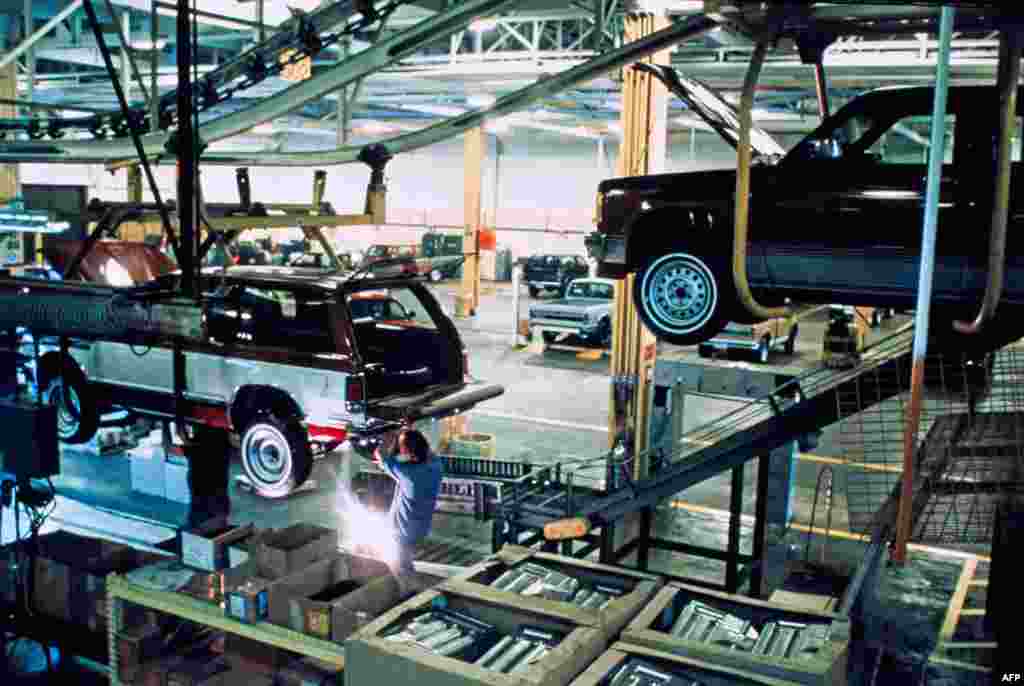June, 1983: An employee works on the assembly line at the Cadillac carmaker plant in Detroit. 