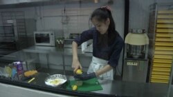 Khris Teri makes all of her doughnuts and toppings by hand. (Dave Grunebaum/VOA)