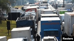 Truckers attend a protest against high diesel fuel prices at BR-116 Regis Bittencourt highway in Sao Paulo, Brazil, May 26, 2018.