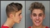 These police booking mugs made available by the Miami Dade County Corrections Department show pop star Justin Bieber, Thursday, Jan. 23, 2014.