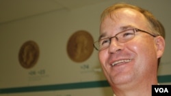 Money Museum curator Dr. Paul Bayliss. (Darren Taylor for VOA News)