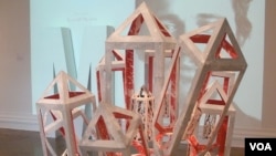 Corcoran fine art major Hope Sorensen created this cut paper sculpture. (Photo: VOA/J. Taboh) 