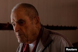 Former coal miner Paul Hylton, who has black lung disease, leaves after Sunday services at the coal company camp Calvary Baptist Church in Stonega, Virginia, U.S., May 20, 2018.